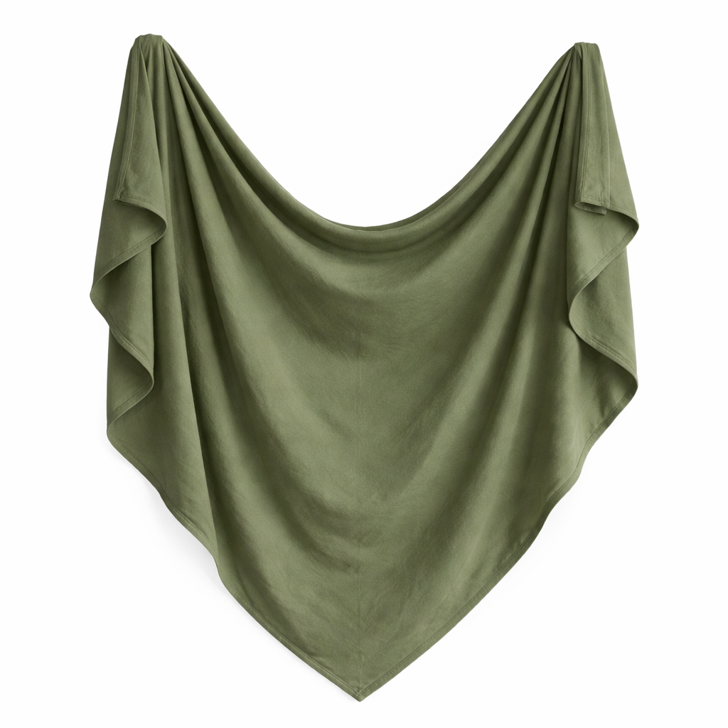 Heirloom organic swaddle in olive green by Sprout & Fawn, featuring soft fabric and a cozy, versatile design.