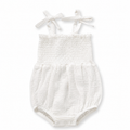 Sprout & Fawn Willow tie-strap romper featuring a relaxed fit, light fabric, and adjustable straps, perfect for casual summer wear.