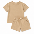 Sprout & Fawn The Sand Essential Set with colorful sand toys and tools for kids' beach and sensory play.
