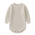 Sprout & Fawn oat-colored waffle knit romper for babies, featuring a cozy, textured waffle pattern and soft fabric.