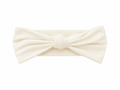 Sprout & Fawn bamboo bow headband in vanilla cream, featuring a soft fabric bow on a stretchy headband for infants or toddlers.