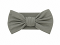 Sprout & Fawn bamboo bow headband in sage green, featuring a soft, fabric-covered bow and adjustable headband for infants and toddlers.