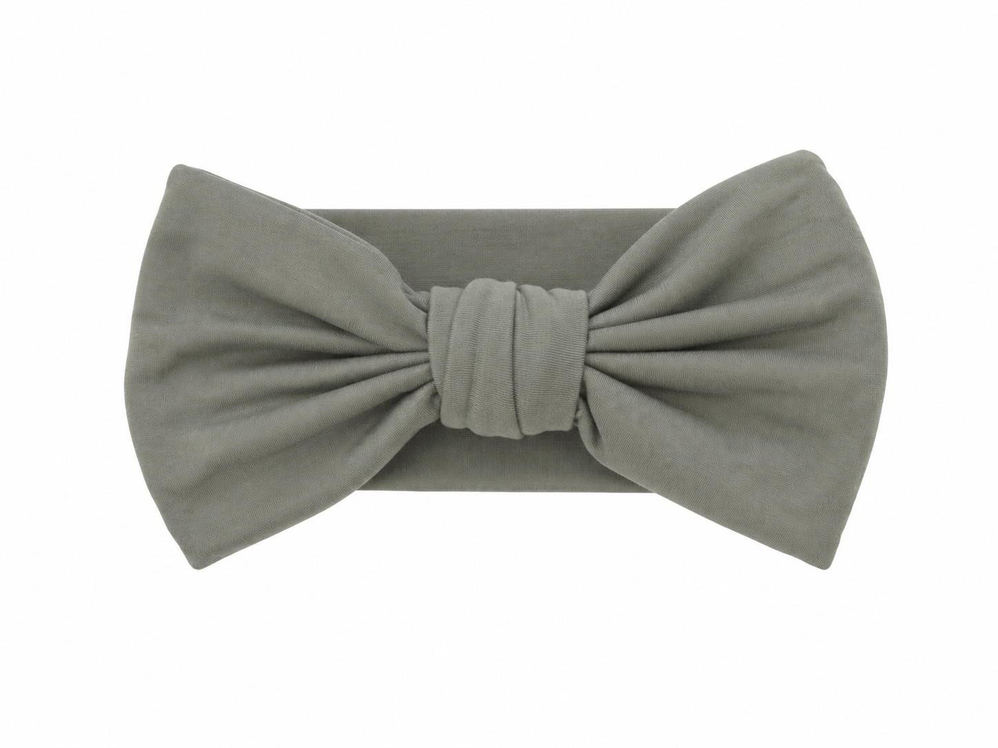 Sprout & Fawn bamboo bow headband in sage green, featuring a soft, fabric-covered bow and adjustable headband for infants and toddlers.